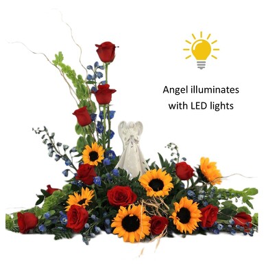 WE TREASURE YOUR MEMORY ANGEL TRIBUTE from Flowers by Ray and Sharon in Muskegon, MI