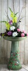 Colorful Birds on a Bird Bath from Flowers by Ray and Sharon in Muskegon, MI