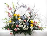 BEAUTIFUL MEMORIES CASKET SPRAY from Flowers by Ray and Sharon in Muskegon, MI