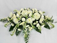 NEVER FORGOTTEN CASKET SPRAY from Flowers by Ray and Sharon in Muskegon, MI